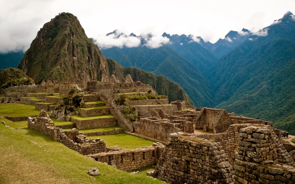 Ancient Ruins Mountains Greenery Stone Structures