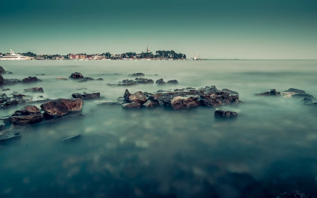 Calm Sea Rocks Coastal Town Boats Misty