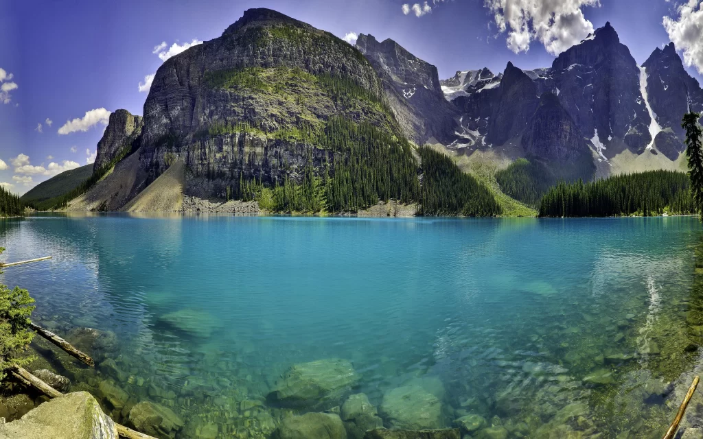 Clear Blue Lake Majestic Mountains Green Forest Rocky Peaks Snowy Summit Clouds
