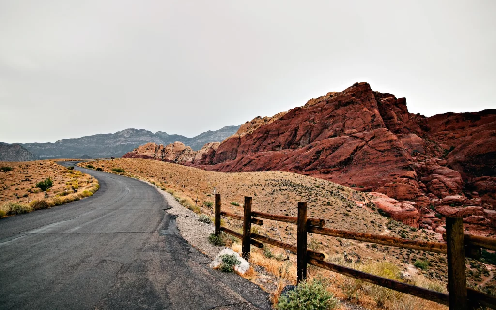 Desert Road Rocky Mountains Arid Landscape Wooden Fence Scenic