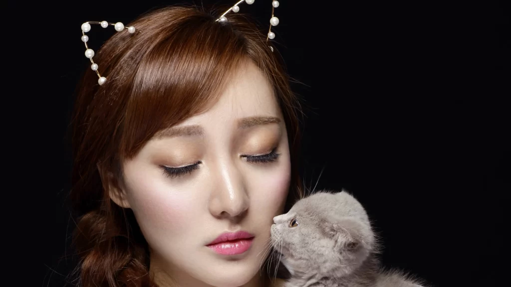 Cat ears, kitten, woman, pink lips, black background