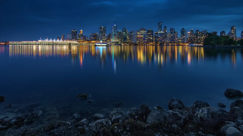 Cityscape night skyline reflection water lights