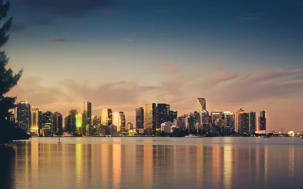 Cityscape skyline sunset water reflection buildings dusk urban