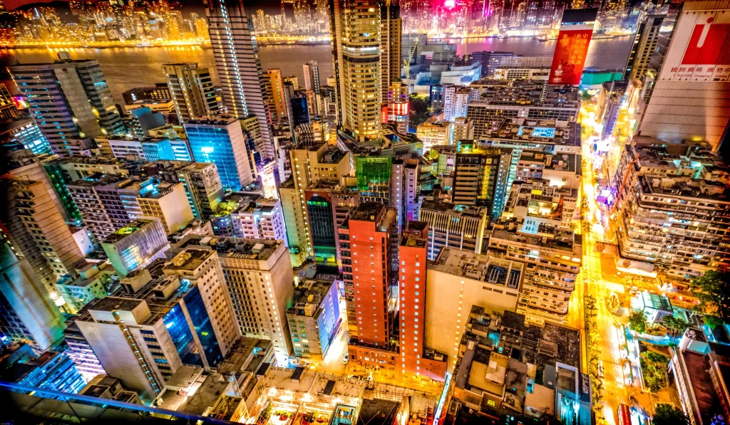 Cityscape skyscrapers night lights urban vibrant neon skyline architecture
