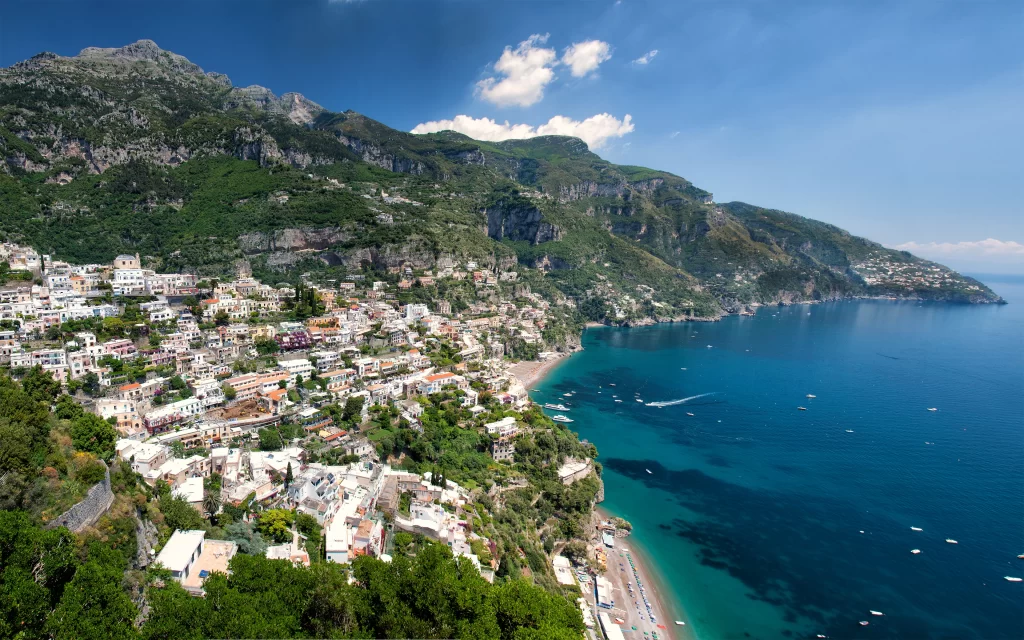 Coastal Town Mountainous Terrain Blue Sea Boats Beach