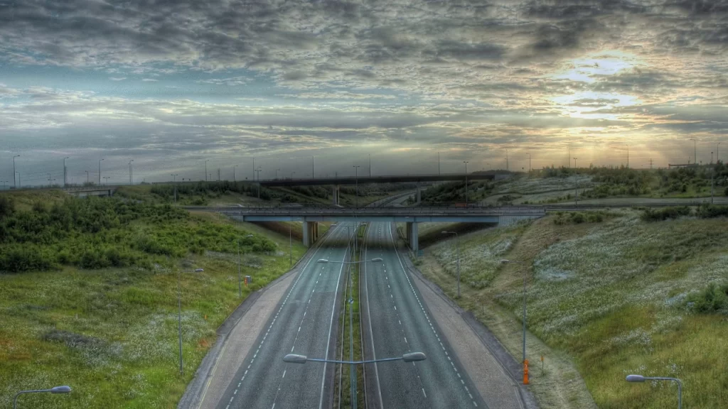 Highway bridge landscape sunset clouds road