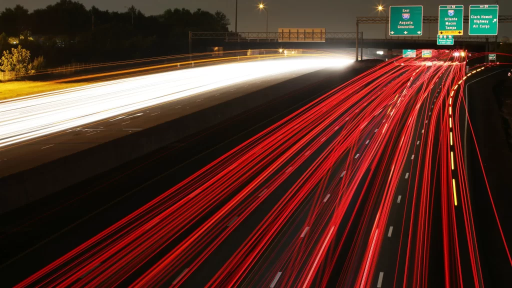 Highway traffic lights night motion blur