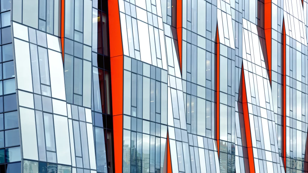 Modern architecture geometric patterns glass facade vibrant colors urban design