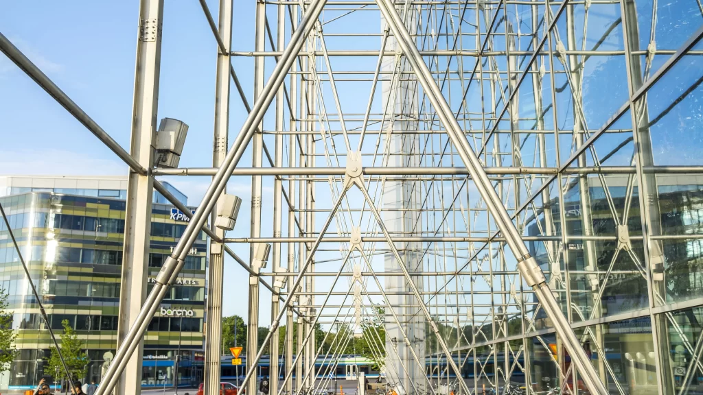 Modern architecture glass building steel structure urban landscape blue sky sunl