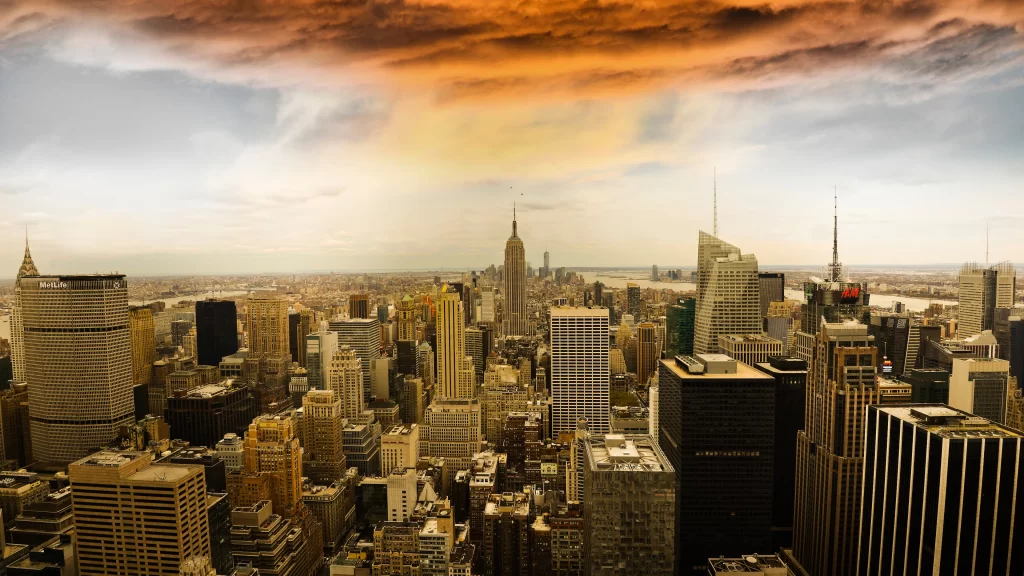 New York City skyline skyscrapers sunset clouds urban architecture