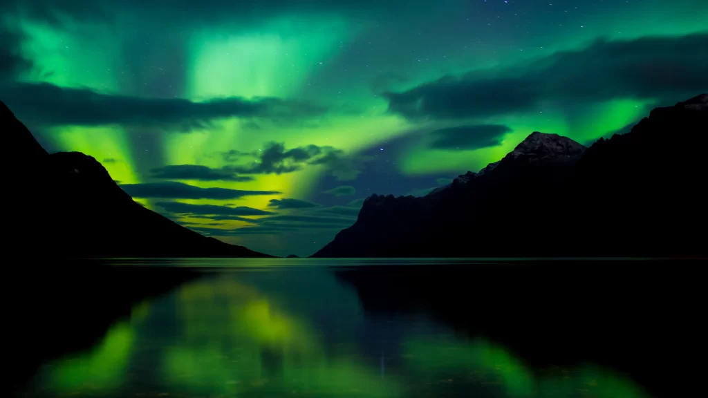 Northern Lights aurora reflection mountains night sky