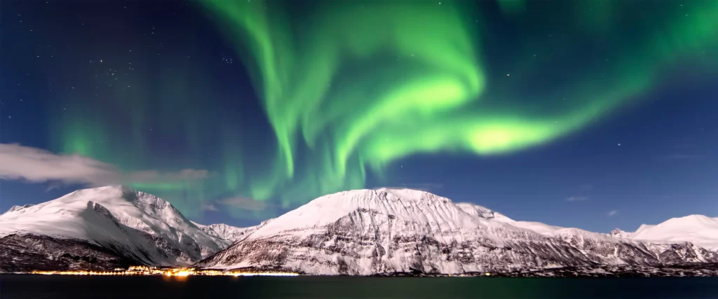 Northern Lights, snow-covered mountains, night sky, stars, aurora, tranquil
