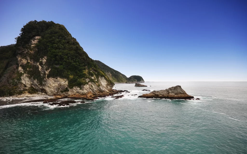 Ocean Waves Rocky Coastline Clear Sky Greenery Tranquil