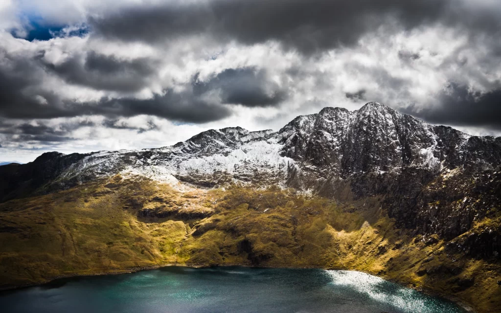 Snowy Mountain Peaks Clouds Lake Rocky Terrain