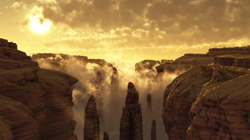 Sunset canyon clouds mist rock formations landscape golden light dramatic