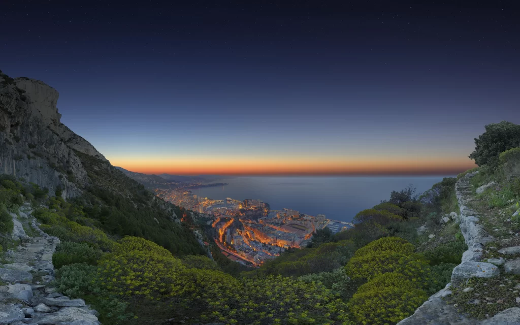 Sunset cityscape ocean mountains twilight landscape