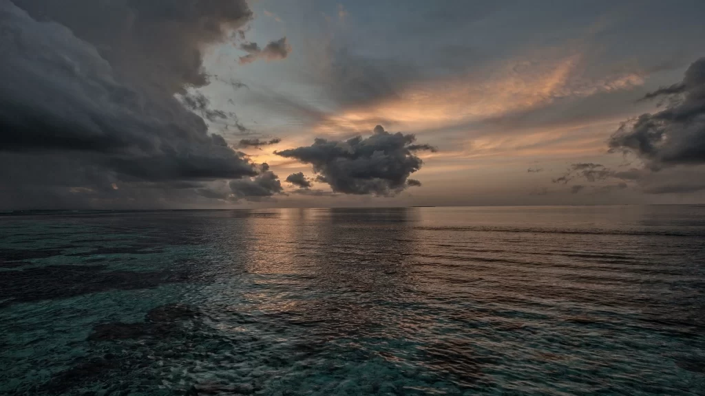 Sunset clouds ocean horizon reflection tranquility