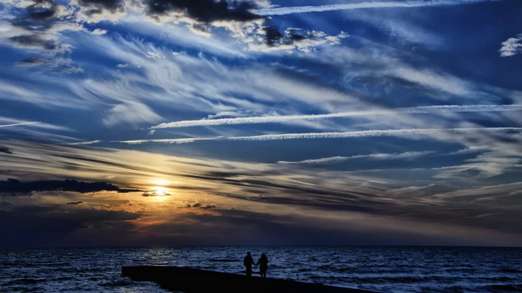 Sunset clouds ocean horizon sky silhouette