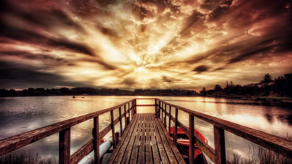 Sunset clouds pier lake reflection tranquility