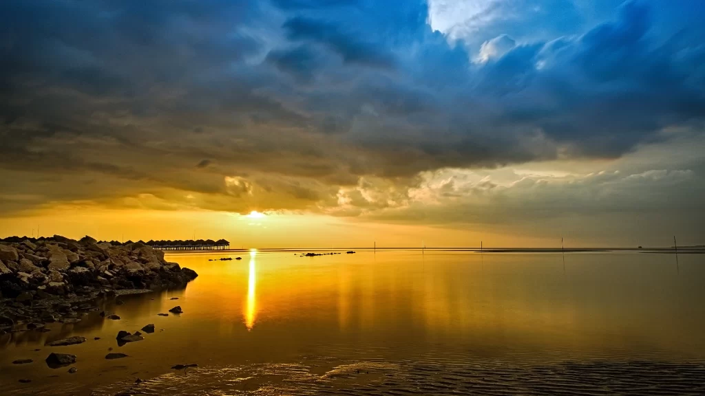 Sunset clouds water reflection horizon tranquility