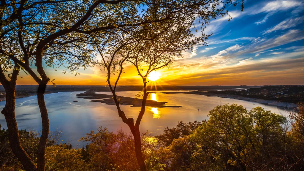 Sunset lake trees sky reflection clouds