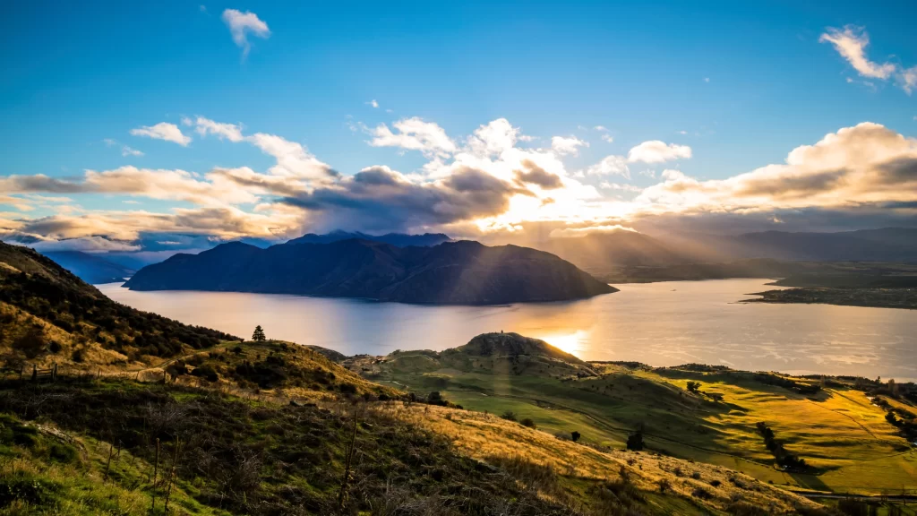 Sunset landscape lake mountains clouds reflection