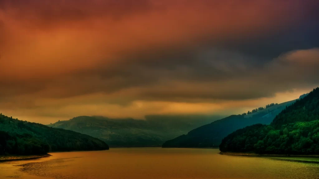 Sunset landscape lake mountains clouds reflection