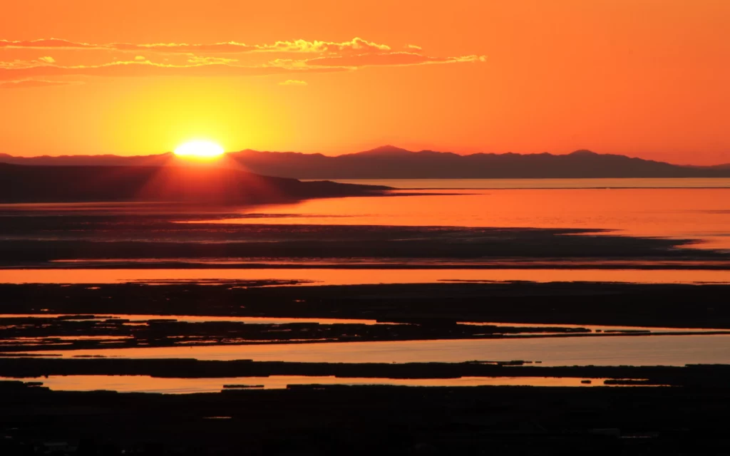 Sunset landscape water sky mountains reflection