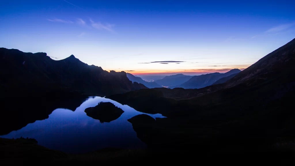 Sunset mountain lake reflection sky clouds