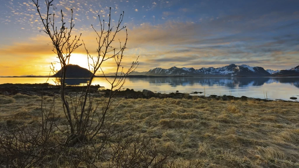 Sunset mountains lake reflection grass sky