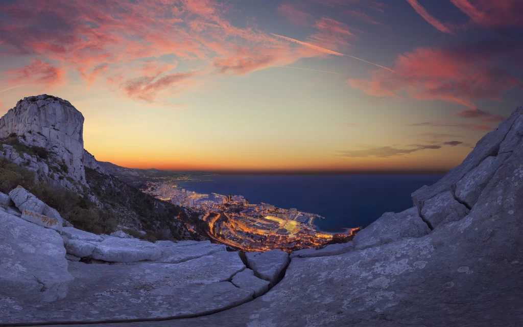 Sunset ocean city mountains clouds twilight