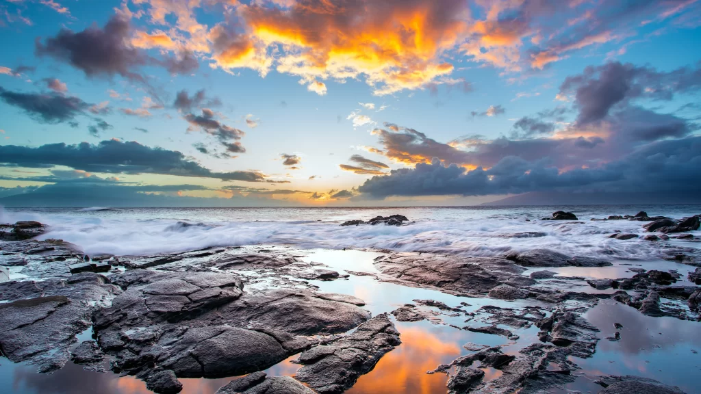 Sunset ocean rocks clouds reflection horizon