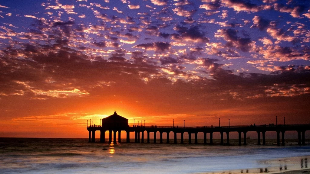Sunset pier ocean clouds sky reflection