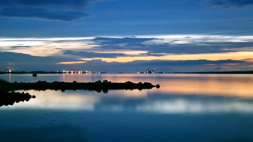 Sunset water sky clouds reflection horizon