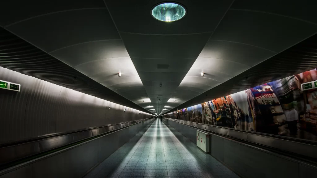 Tunnel escalator lights ceiling wall artwork
