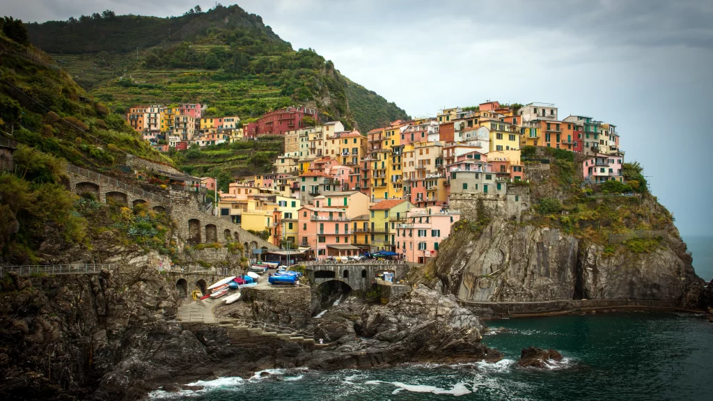 Vibrant village colorful houses rocky coastline Mediterranean sea picturesque la
