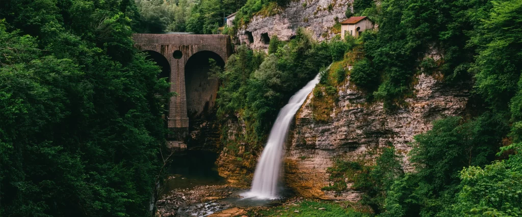 Waterfall, bridge, greenery, nature, architecture, serene