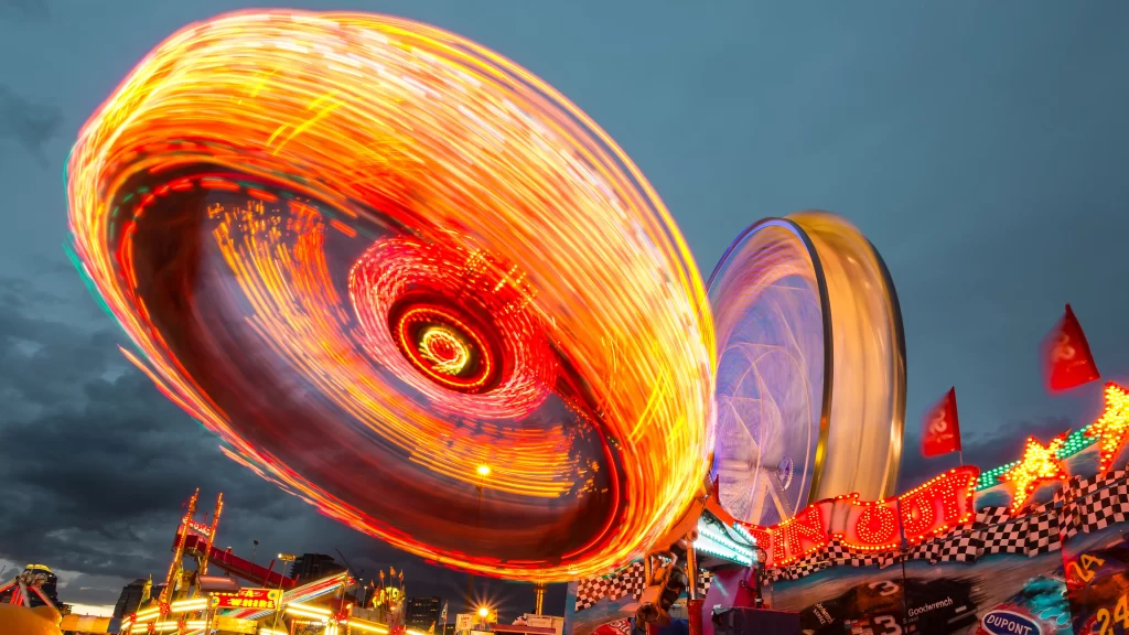 amusement park carnival ferris wheel lights motion evening