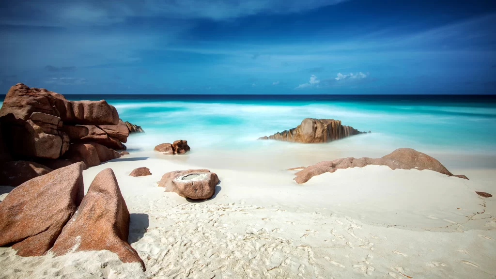 beach, ocean, rocks, sand, sky, clouds