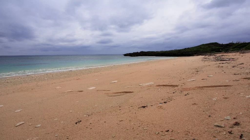 beach ocean sand sky clouds horizon