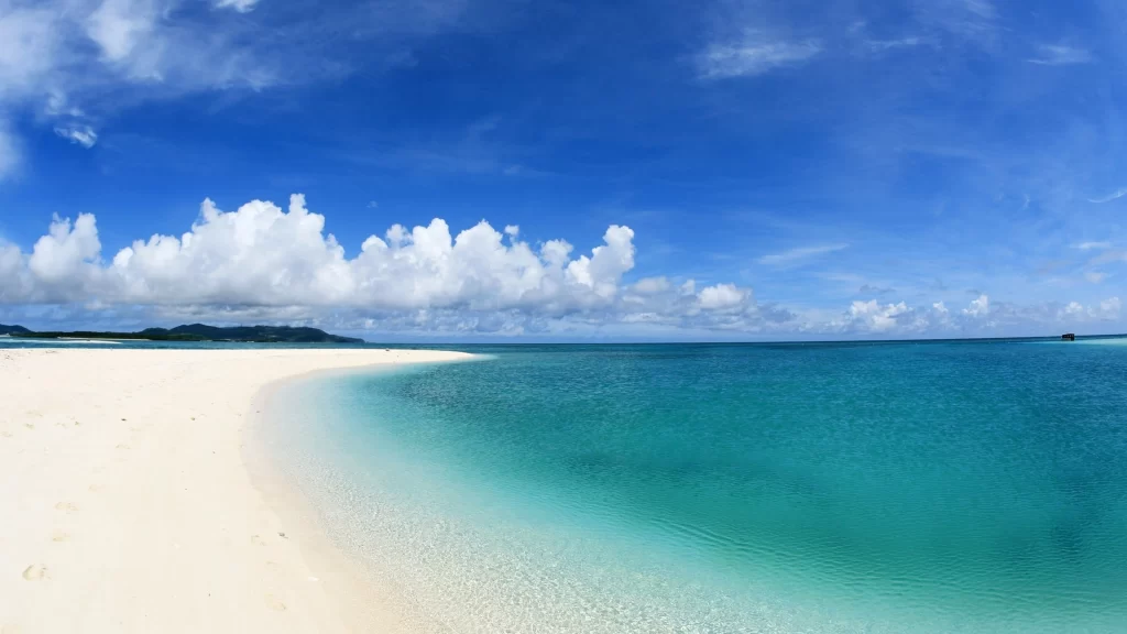 beach ocean sky clouds sand water