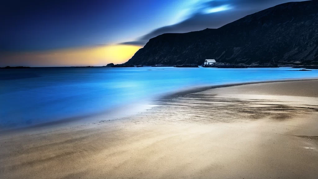 beach ocean sunset sky clouds mountain