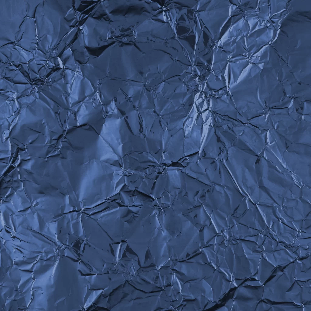 Blue Crumpled Metallic Foil With Reflective Wrinkles