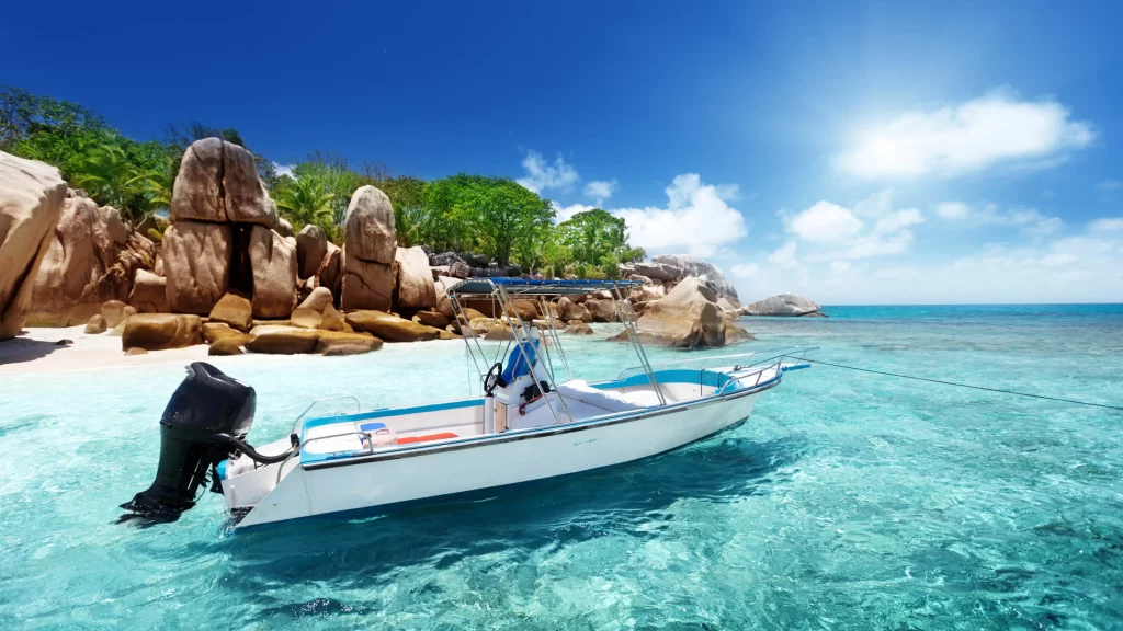 boat, beach, ocean, rocks, sun, clear water