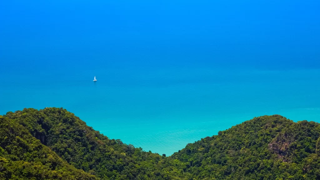 boat sea sky greenery landscape blue