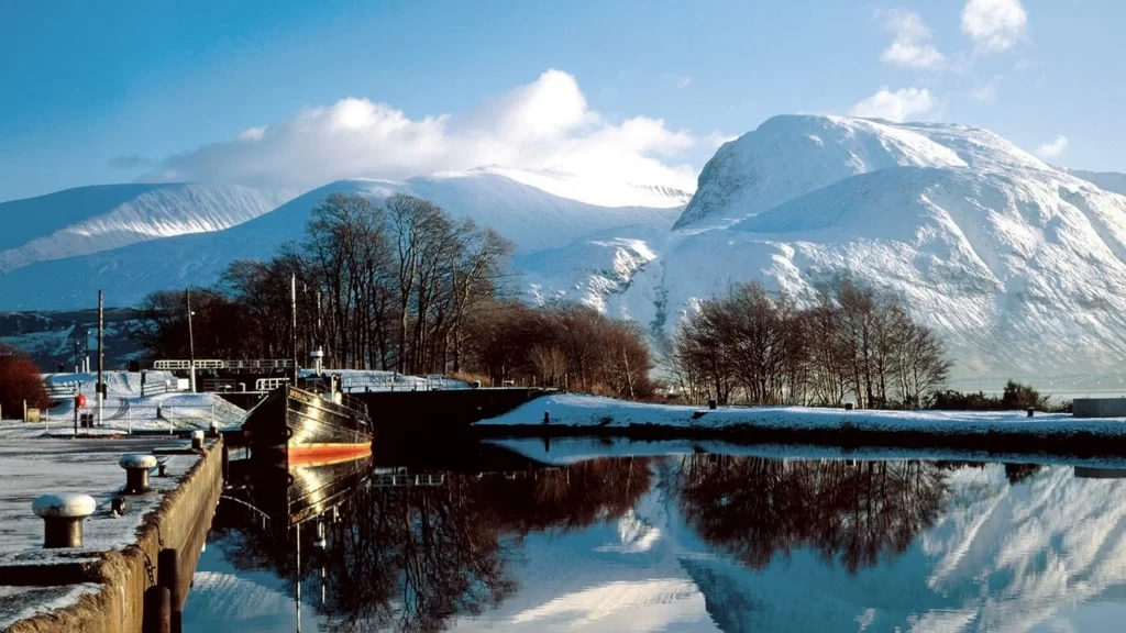 boat snow mountain water reflection winter
