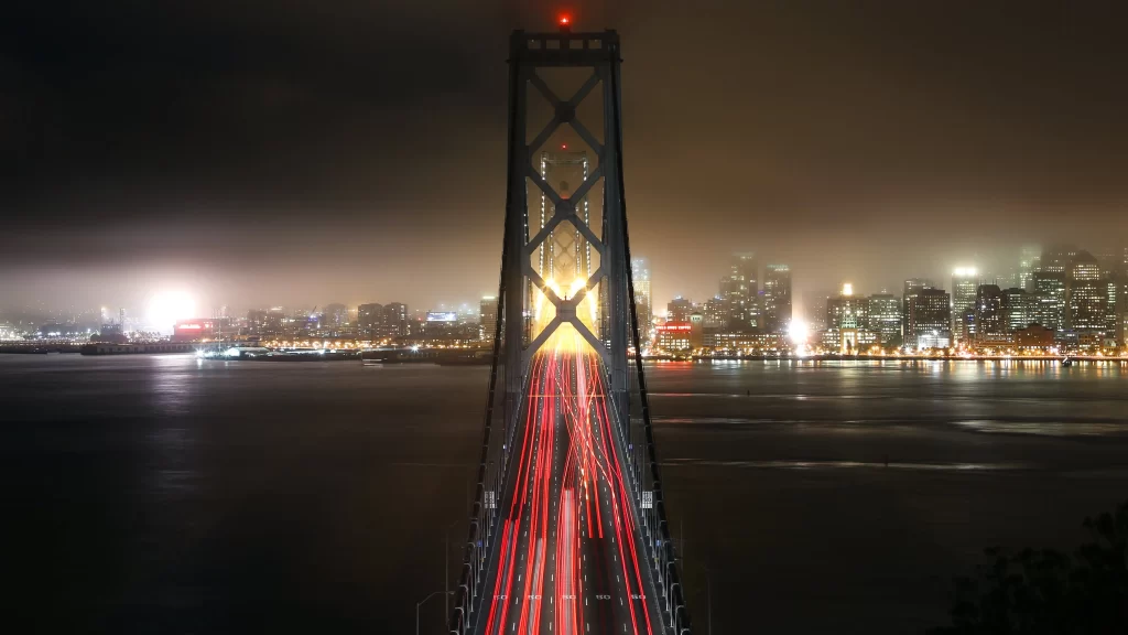 bridge city night lights water skyline
