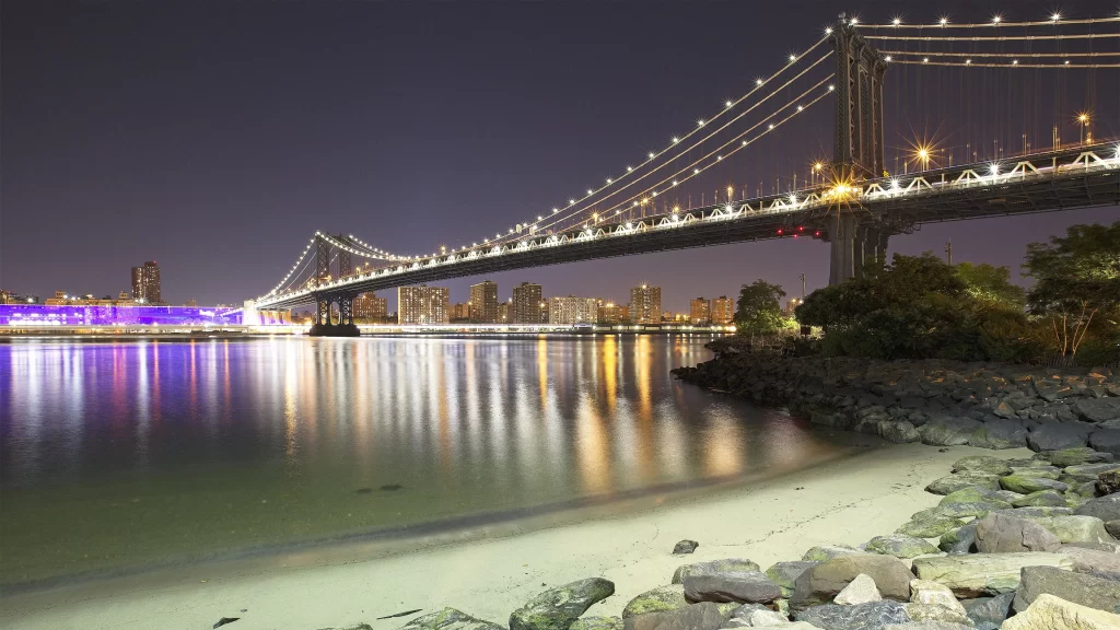 bridge night cityscape lights water reflection skyline urban