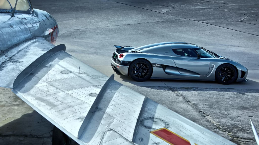 car airplane silver runway luxury contrast