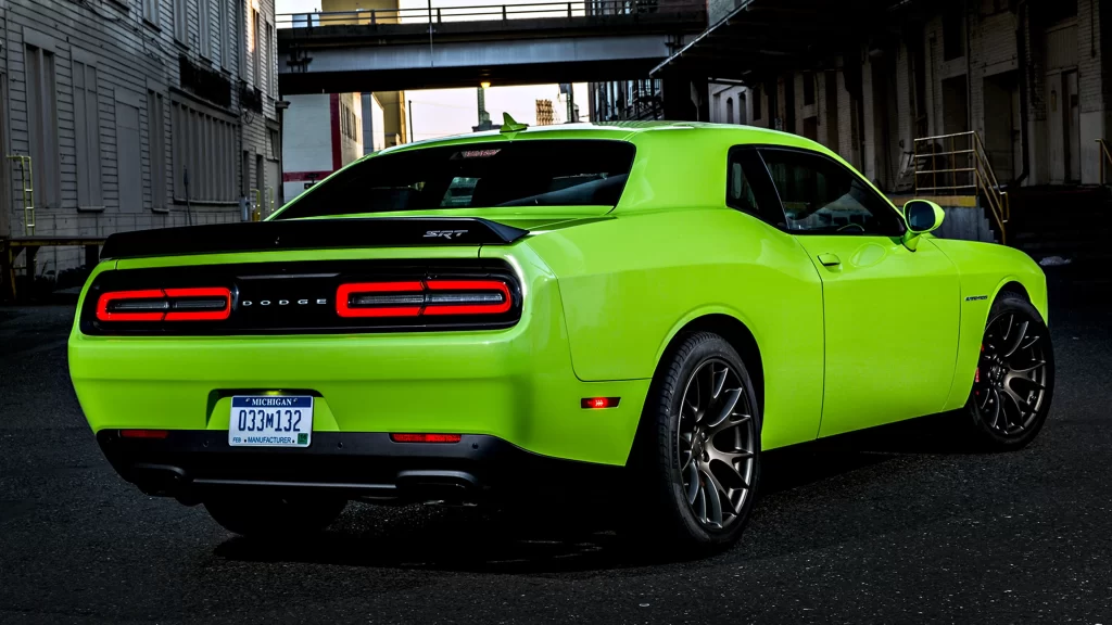 car green urban street license plate buildings